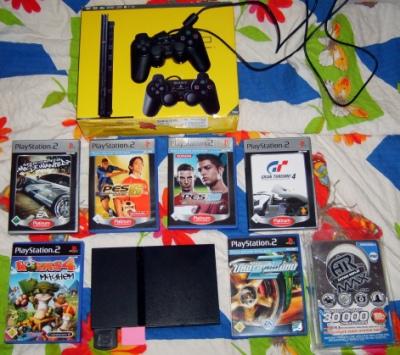 Playstation 2 Slim mit 6 Org. Spiele im Org. Karton top zustand