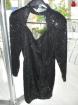 Schwarzes Kleid aus Pailletten